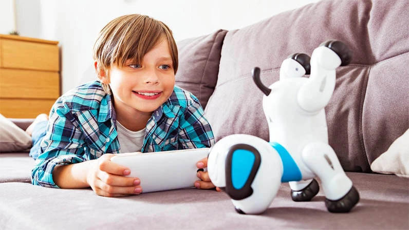 Boy playing with a smart toy